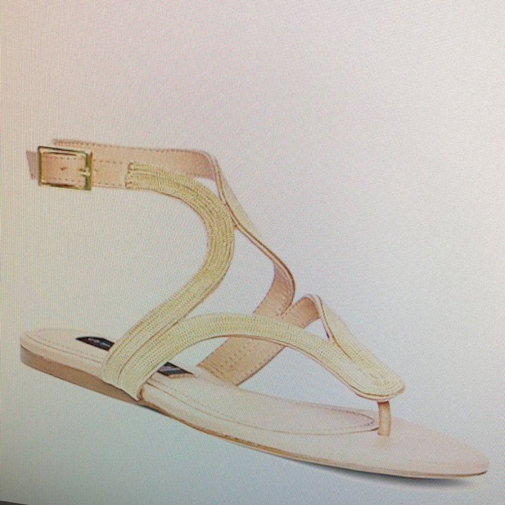 Gently used Steven by Steve Madden Resorts Gold Flat Thong Sandals in size 10
